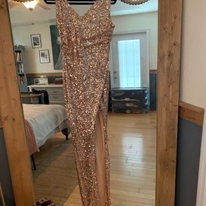 Gold Sequined dress with a high thigh slit